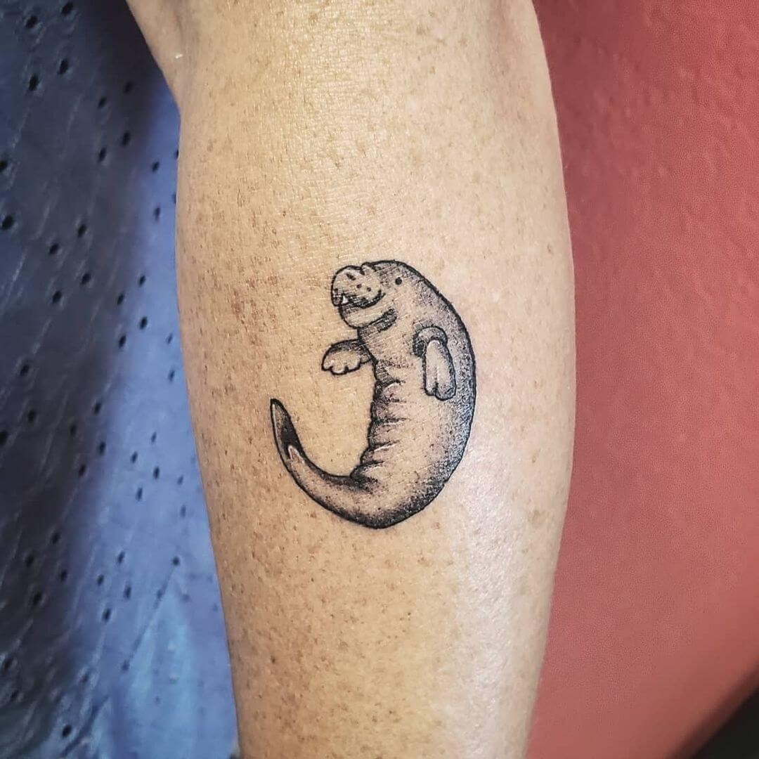 Tiny And Adorable Manatee Tattoo Design