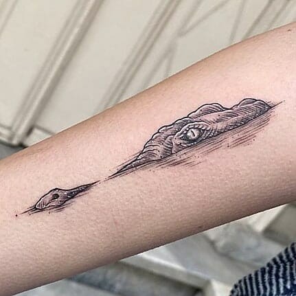 The Partially Submerged Alligator Tattoo