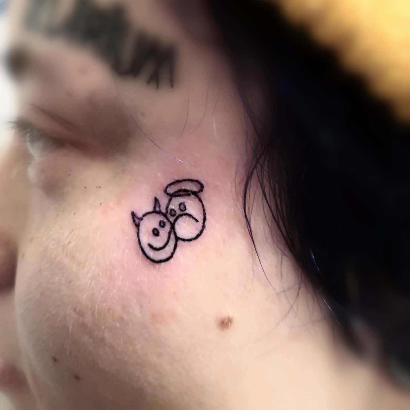 Happy Devil Sad Angel Face Tattoo