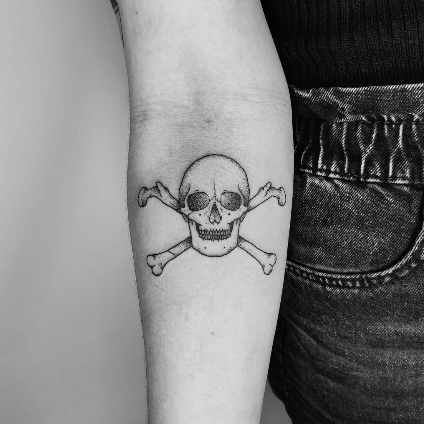 A Classic Skull And Cross Bones Tattoo