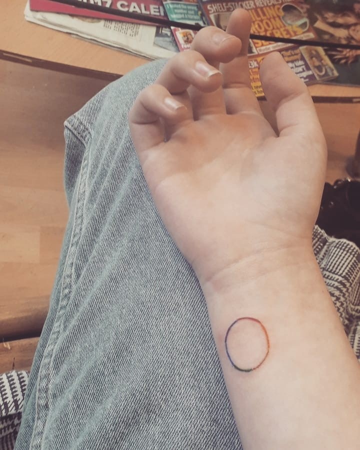 Minimalistic Circle Of Life Tattoo