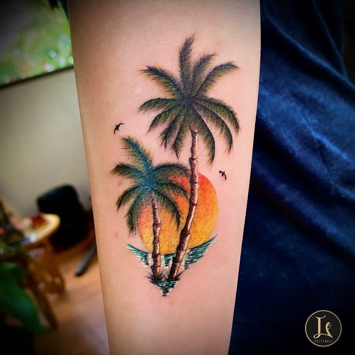 Vibrant Beach Tattoo