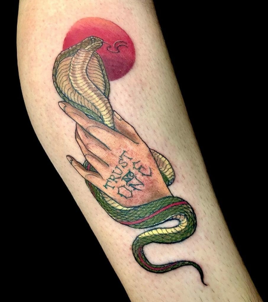 Not Your Typical Trust No 1 Tattoo Catching A Cobra Snake Tattoo Design