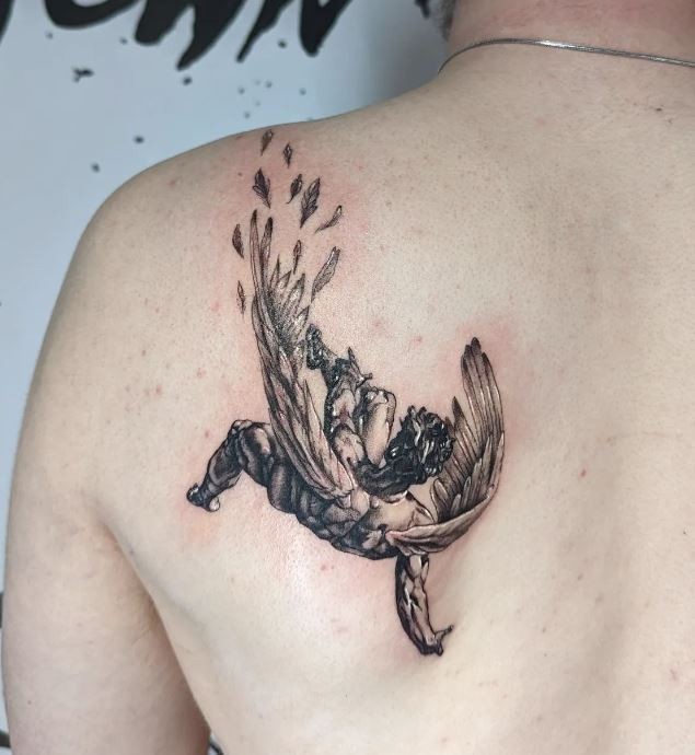 A Complex Graphic Icarus Tattoo