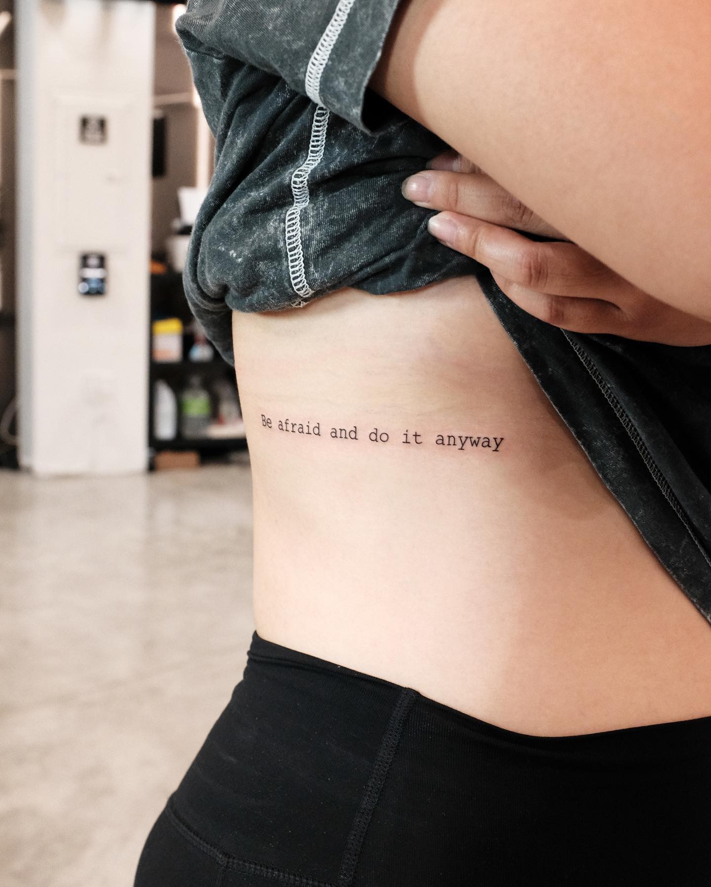 Elegant N Compelling Quote Tattoo