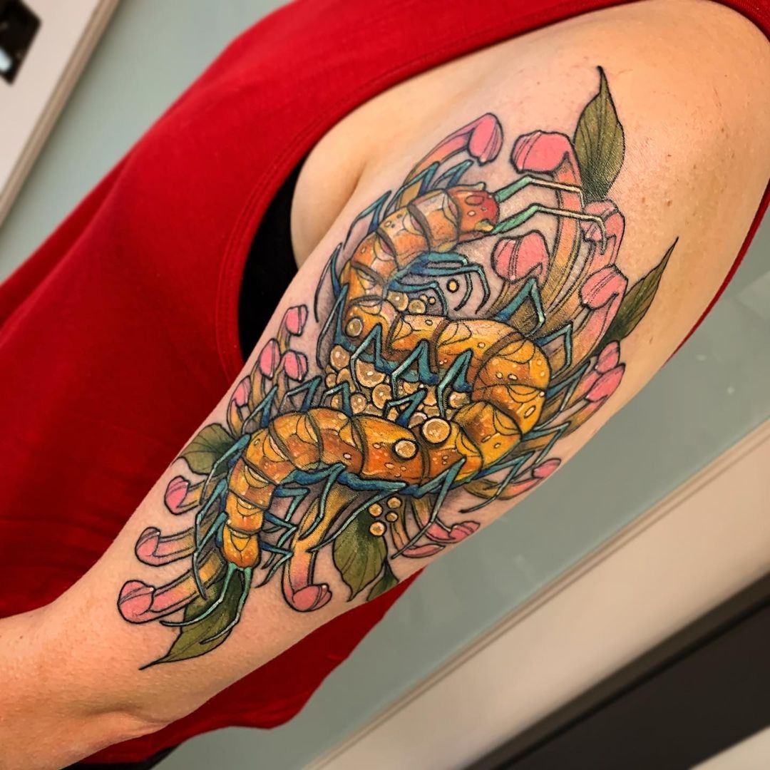 Vibrant Floral Centipede Tattoo