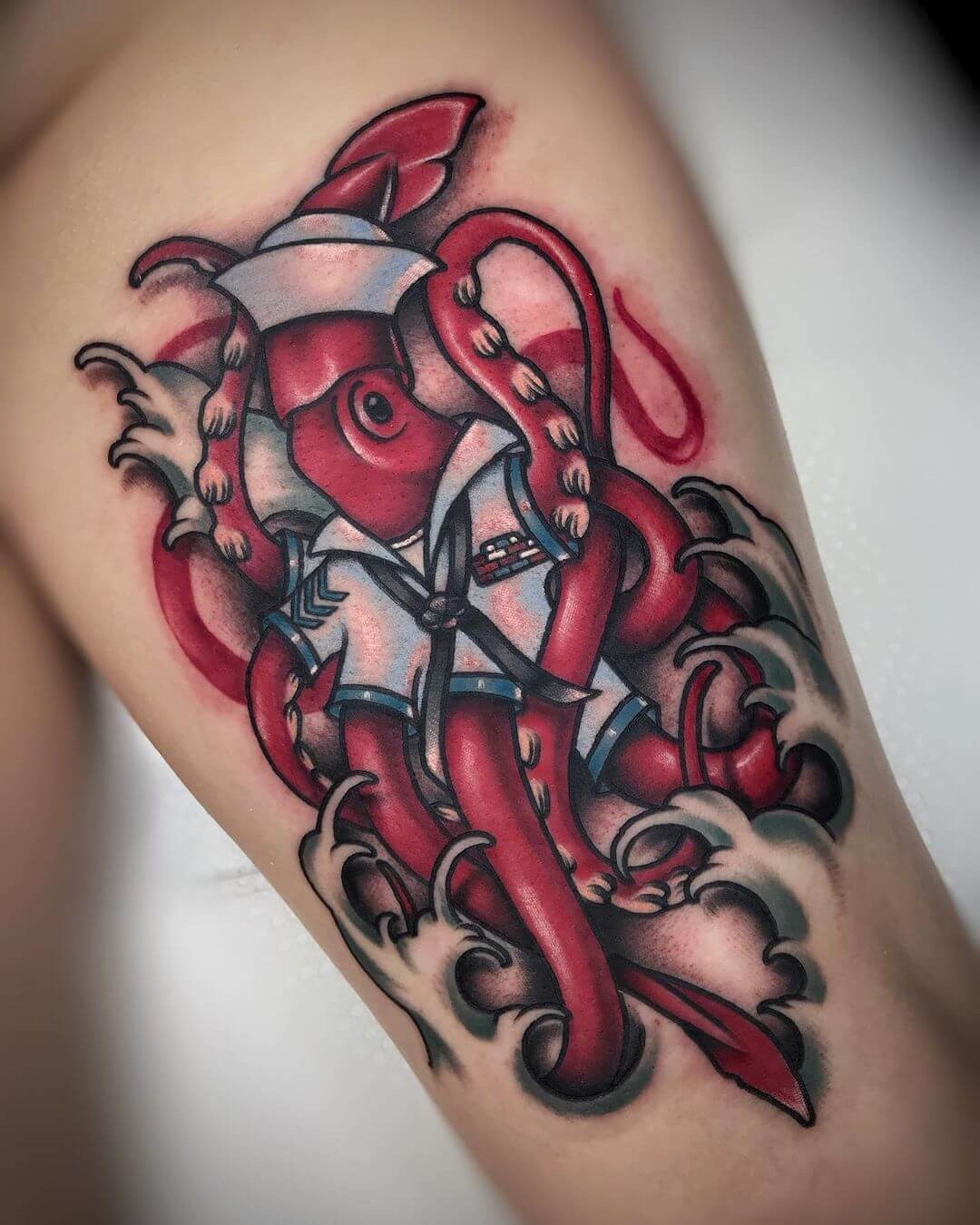 Gorgeous looking Red Squid Tattoo Artist’s Image Of A Sailor Squid At Sea Design