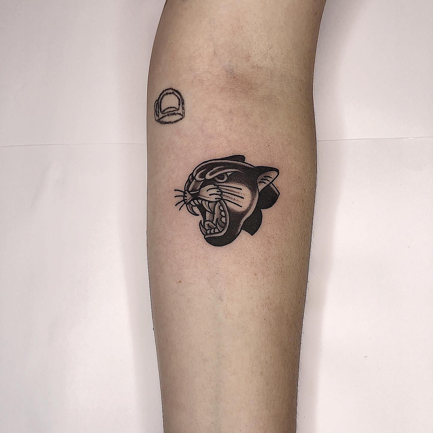 Minimal Black Panther Tattoo