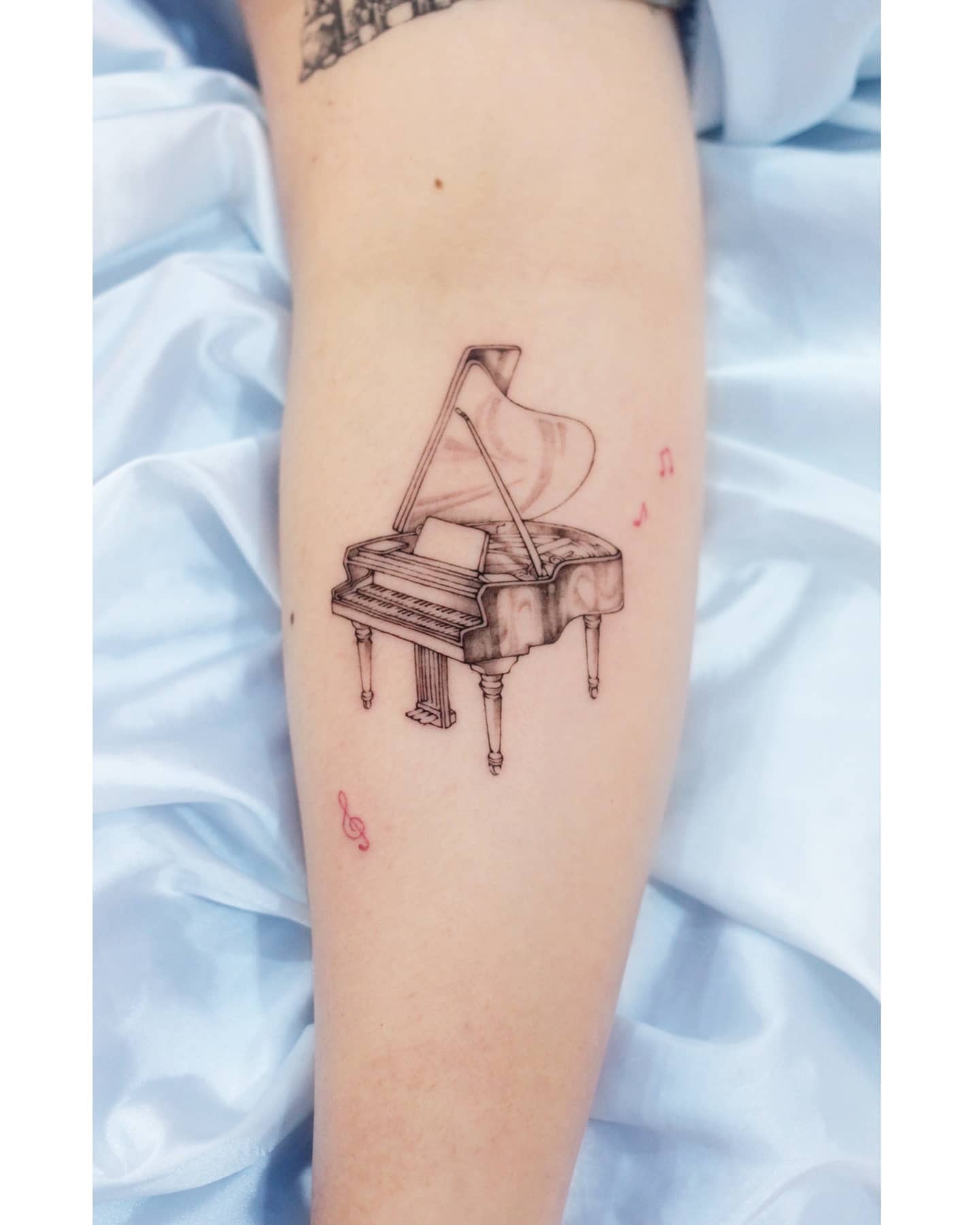 The Grand Piano Tattoo