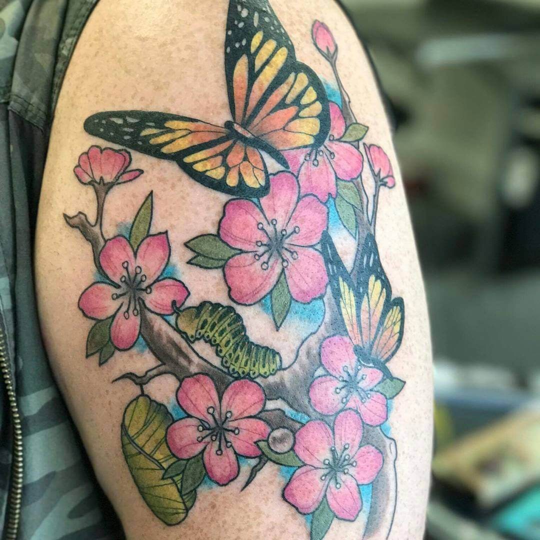 Metamorphosis – Caterpillar and Butterfly Tattoo With Flowers