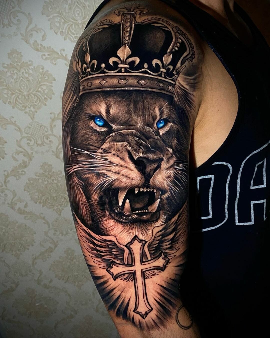 The Crowned Lion With A Cross Tattoo