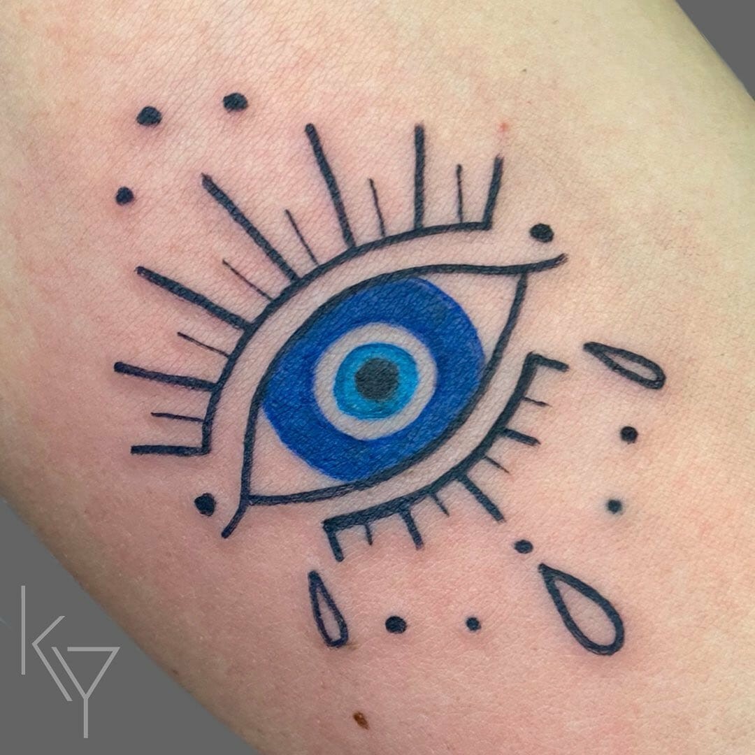 Little Blue Evil Eye Tattoo