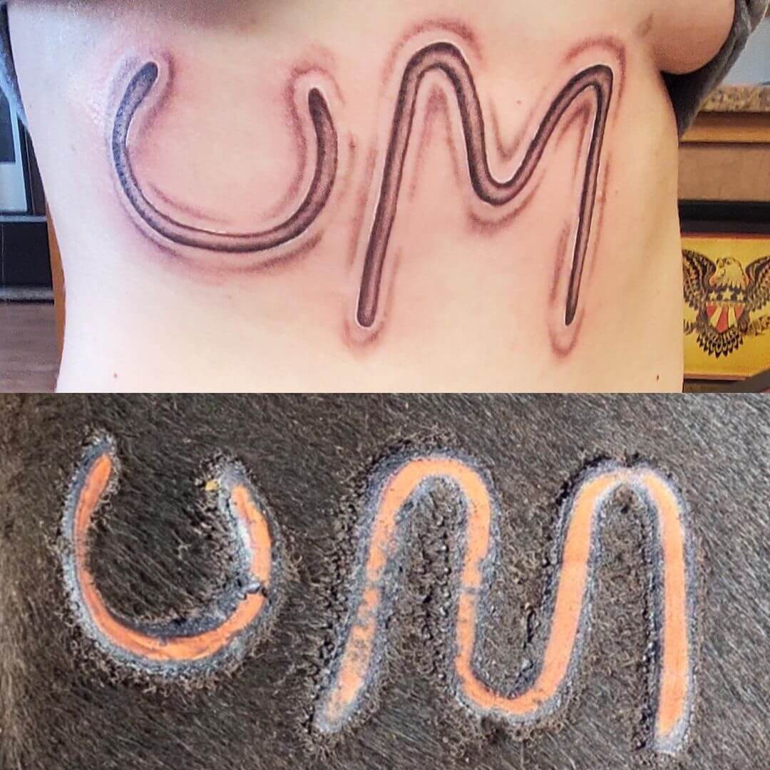 Running UM Cattle Brand Tattoos