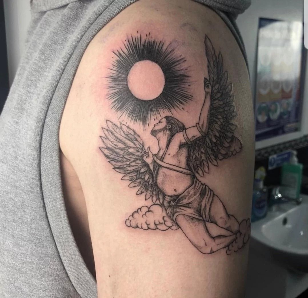 A Complex Graphic Icarus Tattoo