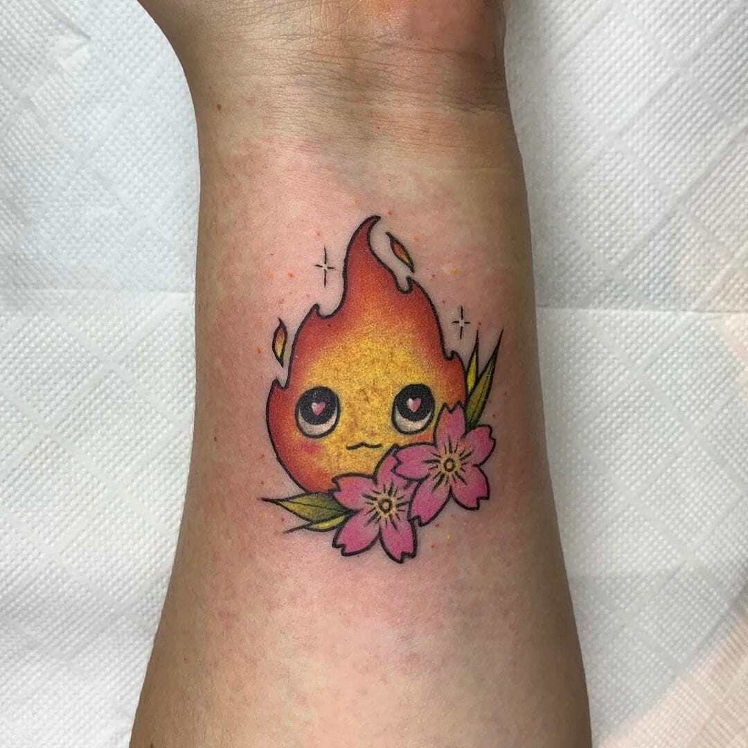 Howl’s Moving Castle Calcifer Tattoo With A Floral Theme