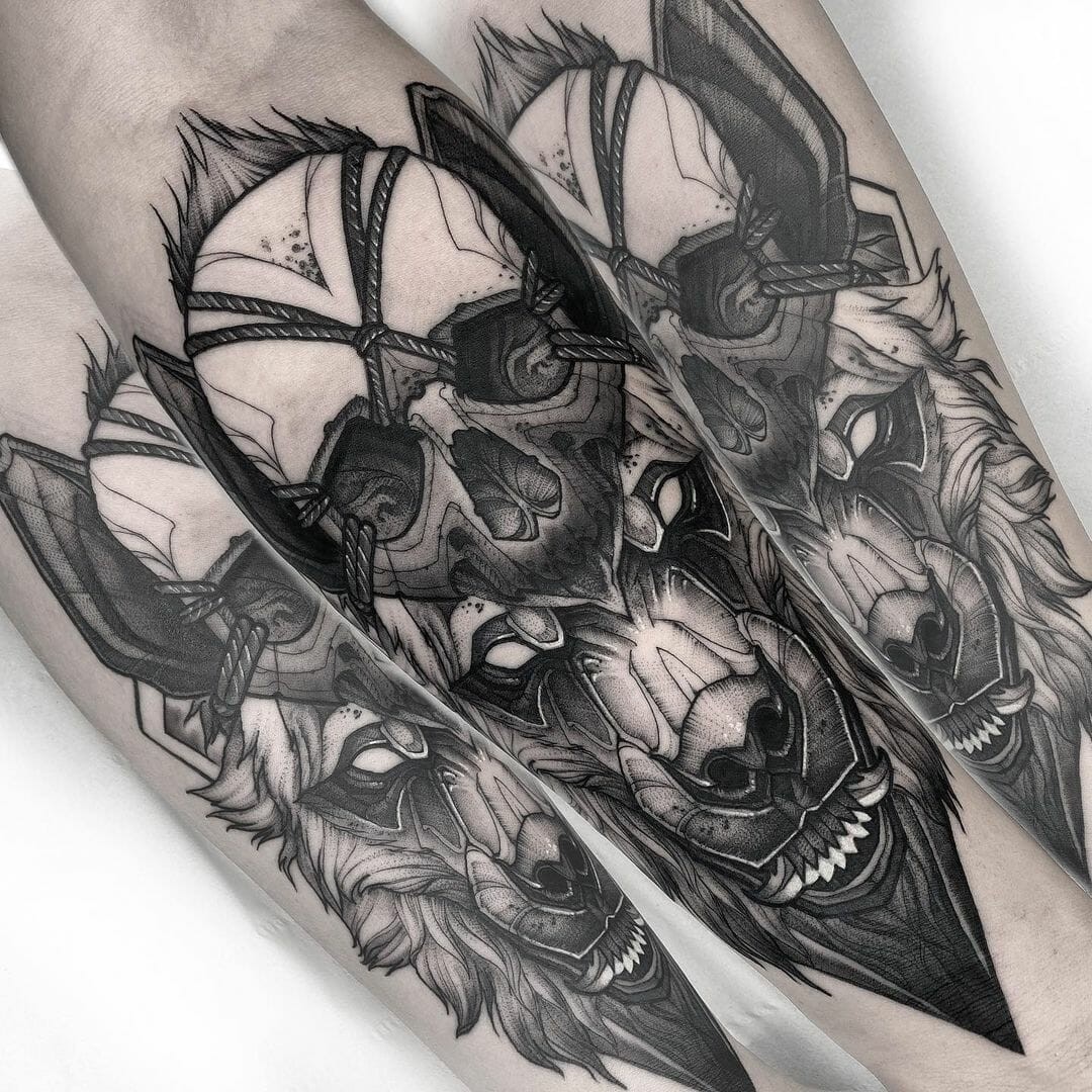 Human Skull And Hyena Tattoos