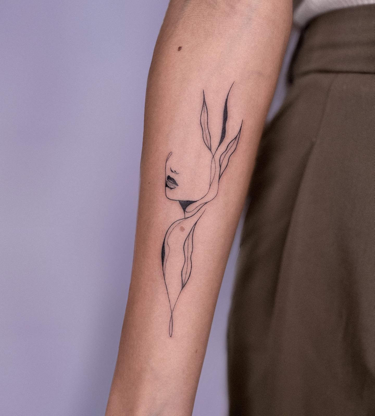 Simple Female Face Tattoo designs