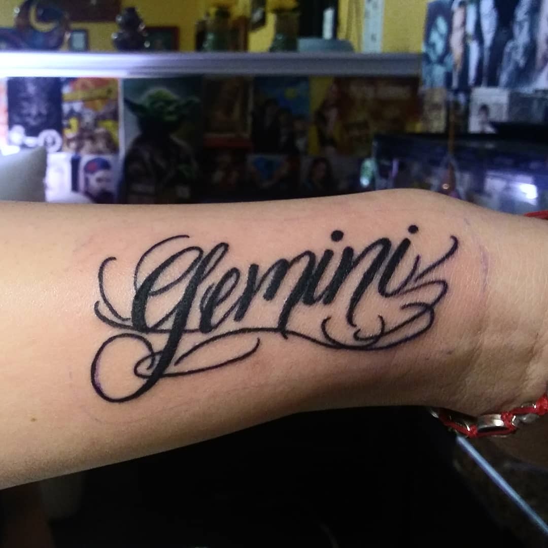 Black Ink Simple Gemini Symbol Tattoo