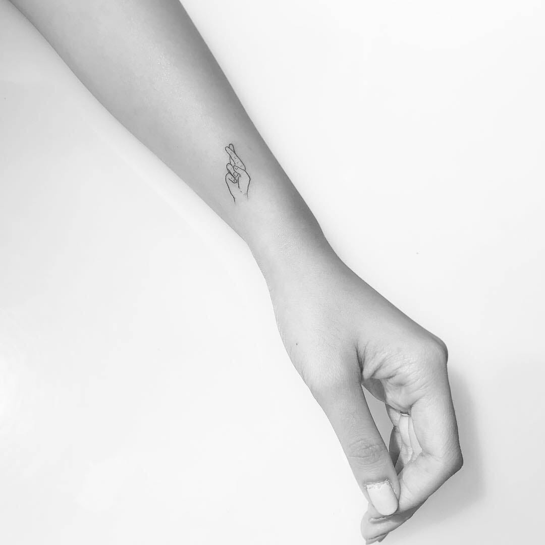 Wrist Small Fingers Crossed Tattoo