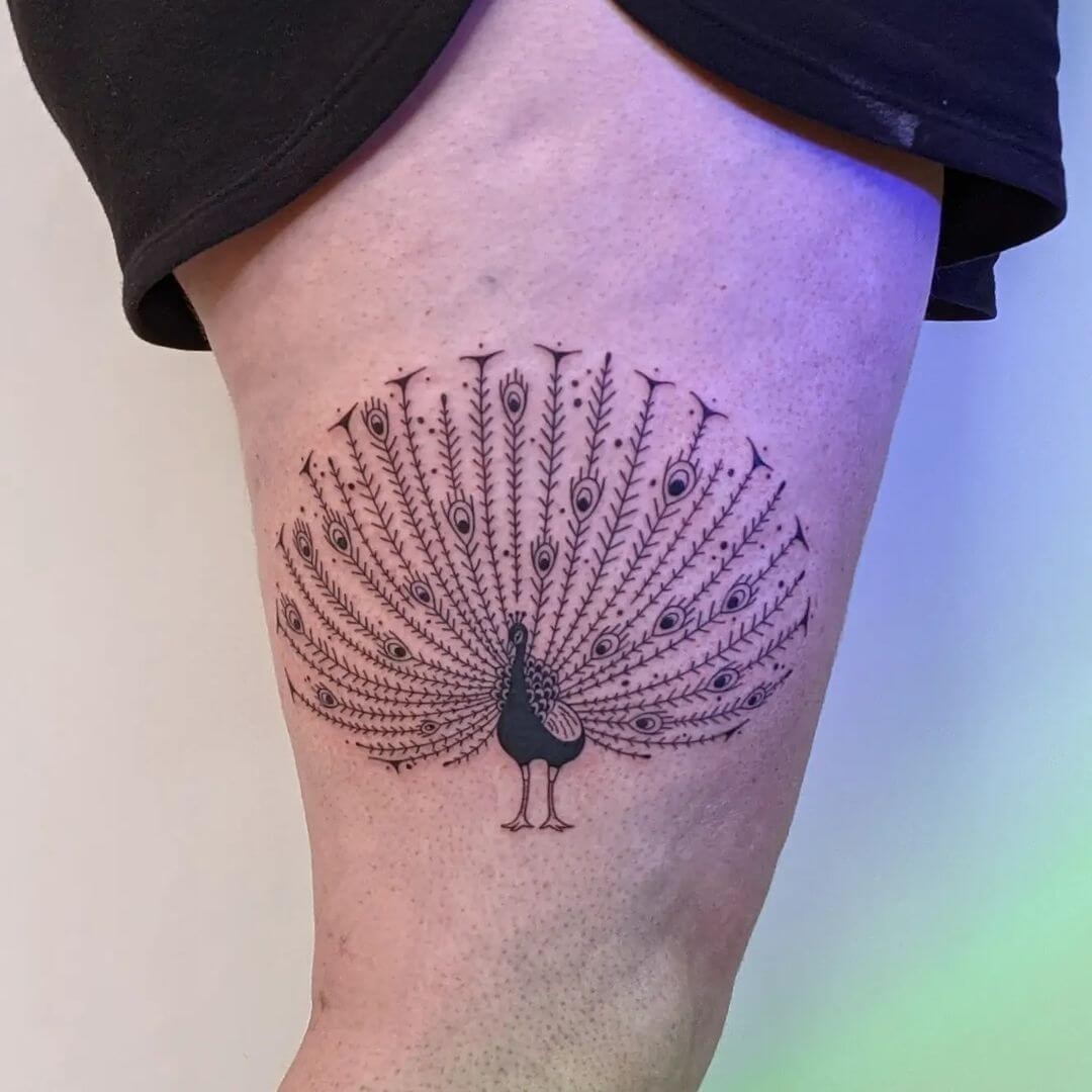 Graceful Peacock Feather Tattoo