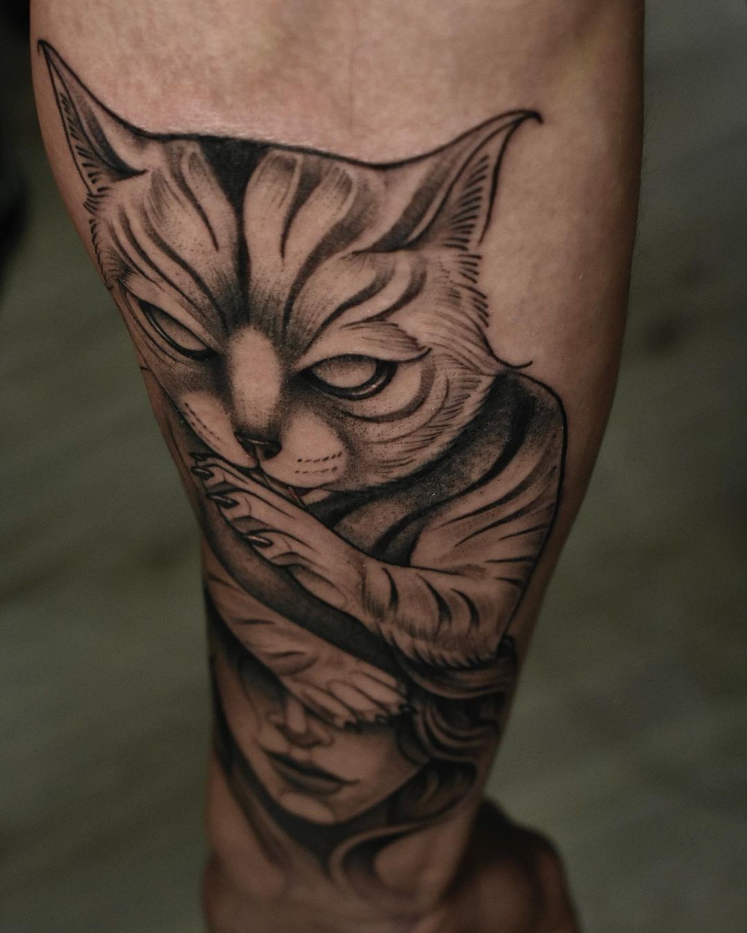 Nocturnal Cat Tattoo Covering The Lady’s Eyes Tattoo