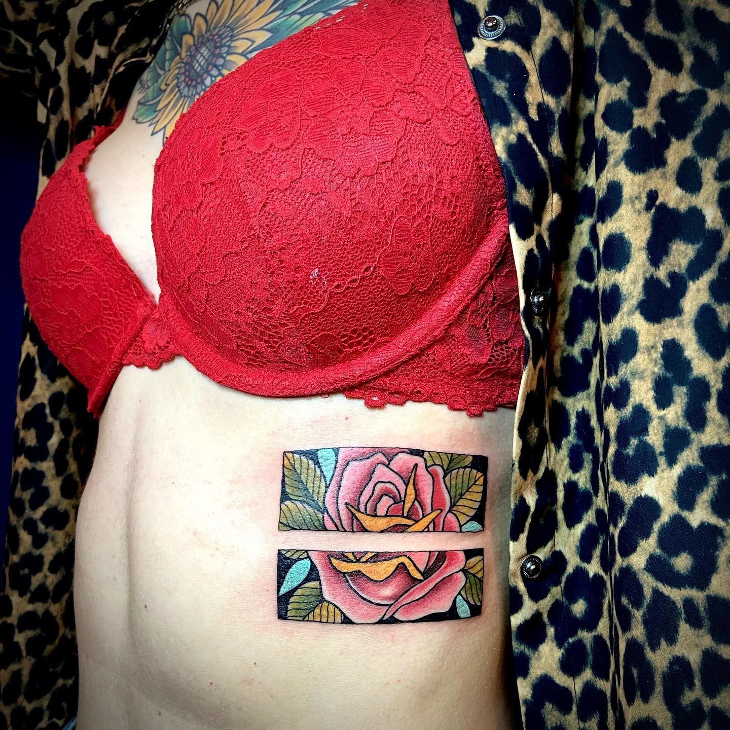 Left Rib Cage Flower Art Red Equal Sign Tattoo Design