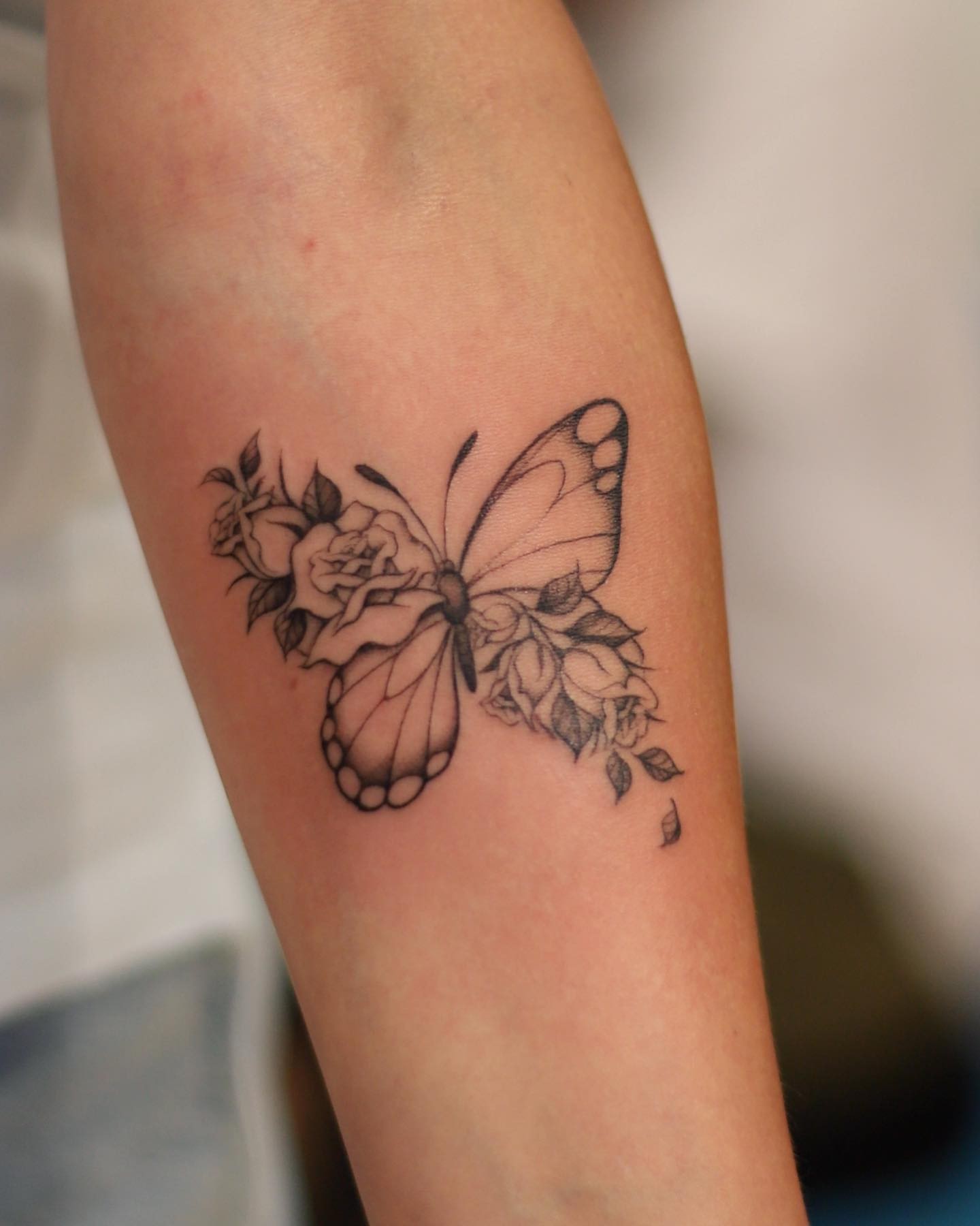 Half Butterfly And Half Rose Tattoo