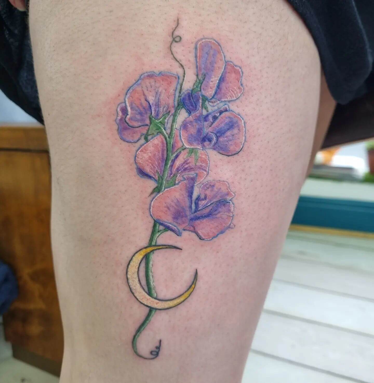 Sweet Pea Moon Thigh Tattoo