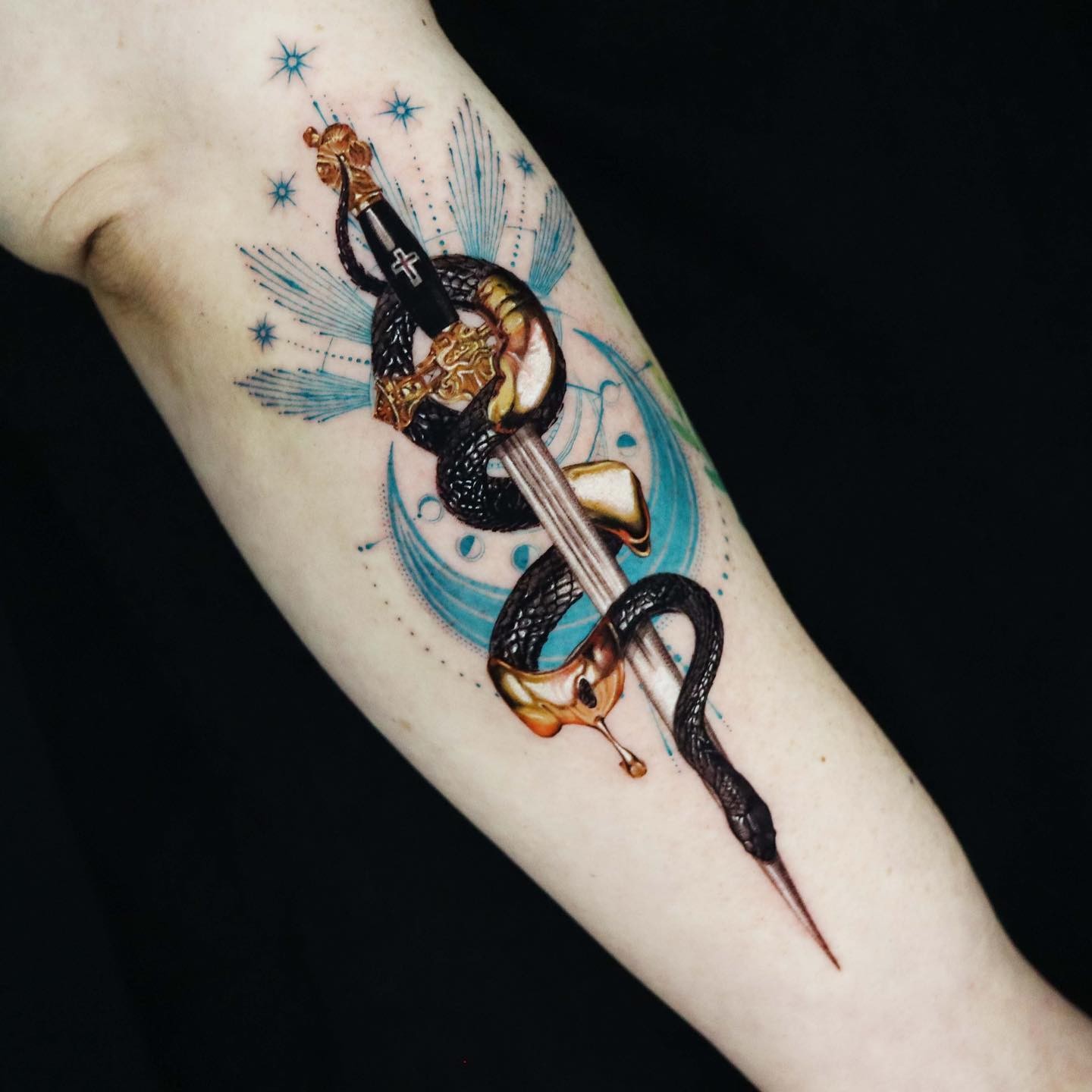 Gold And Black Snake Sword Tattoo