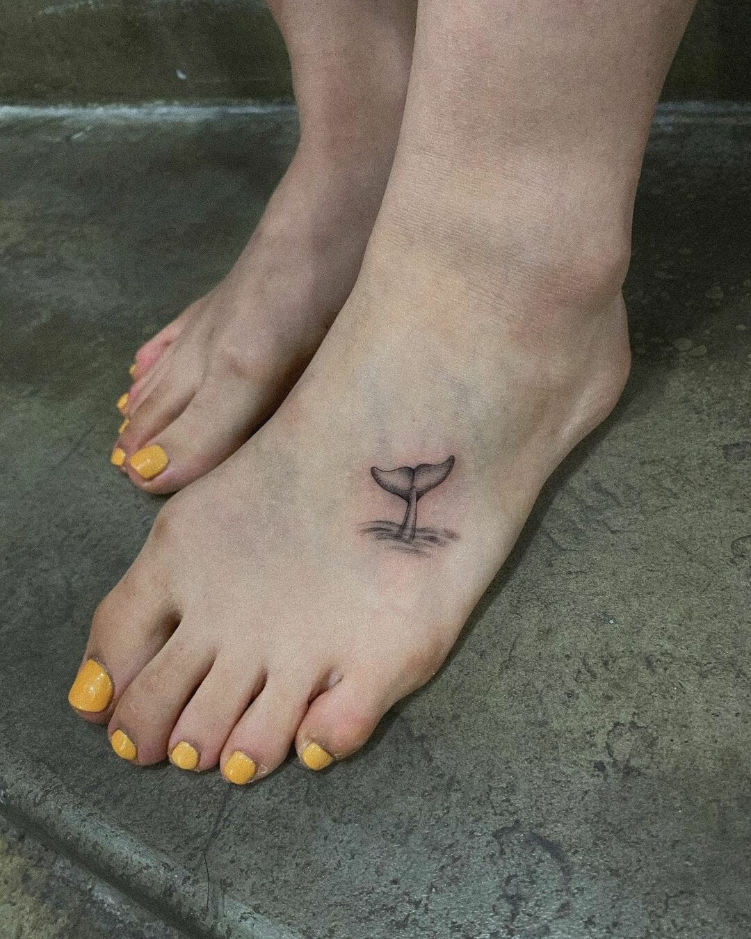 Tiny Dolphin Tattoo