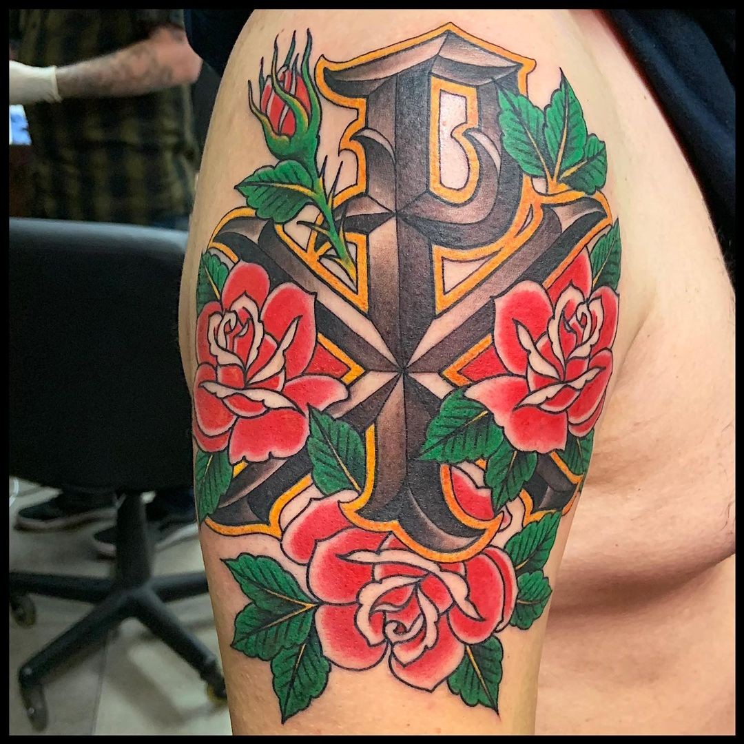 Vibrant Floral Chi Rho Tattoo