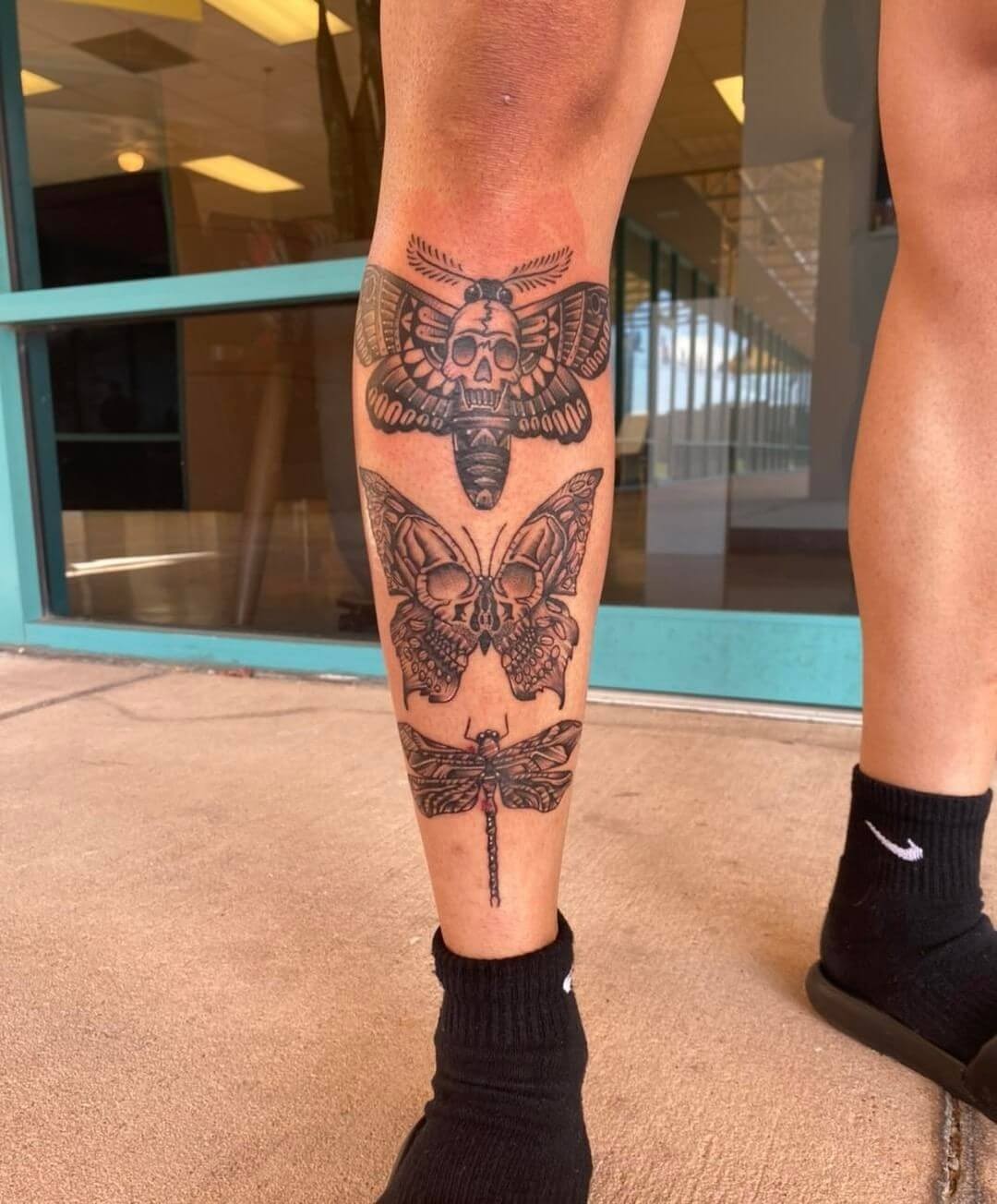 Skull And Butterfly Leg Tattoo Design