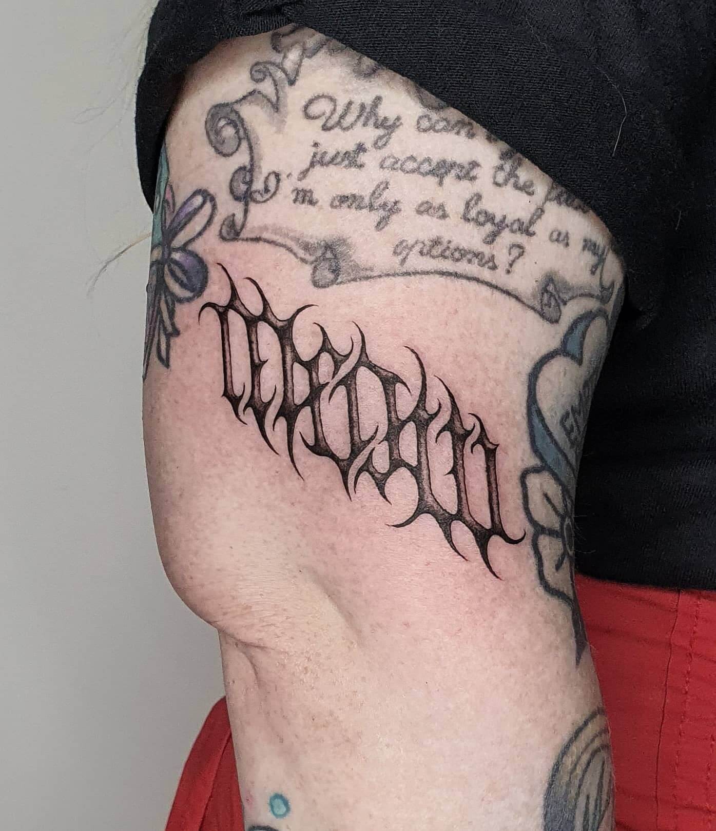 The Optical Illusion Ambigram Tattoo