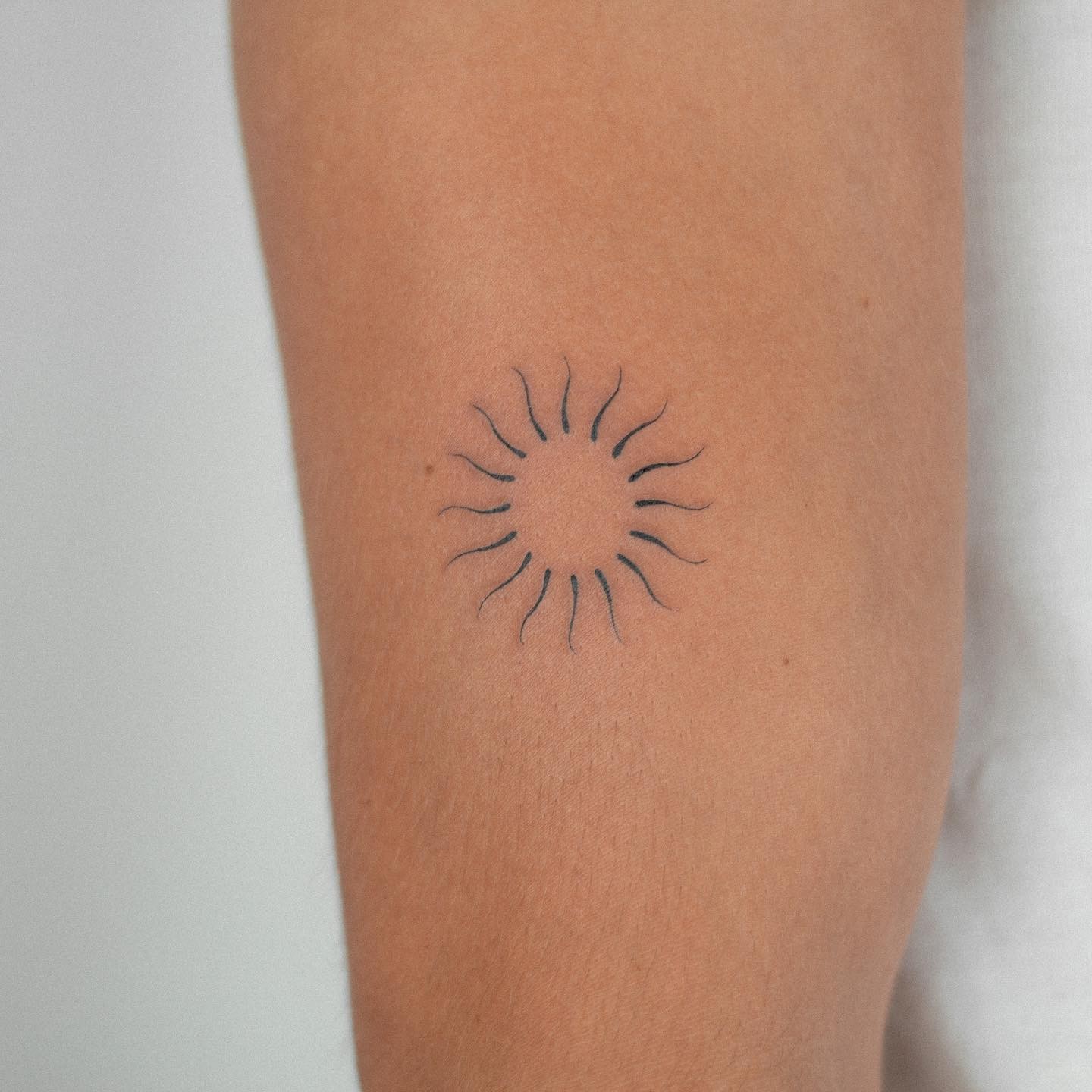 Small Sun Tattoo