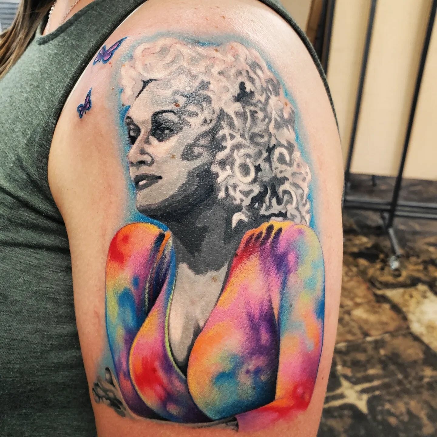 Half-Tattoo Sleeves With Dolly Parton Reference