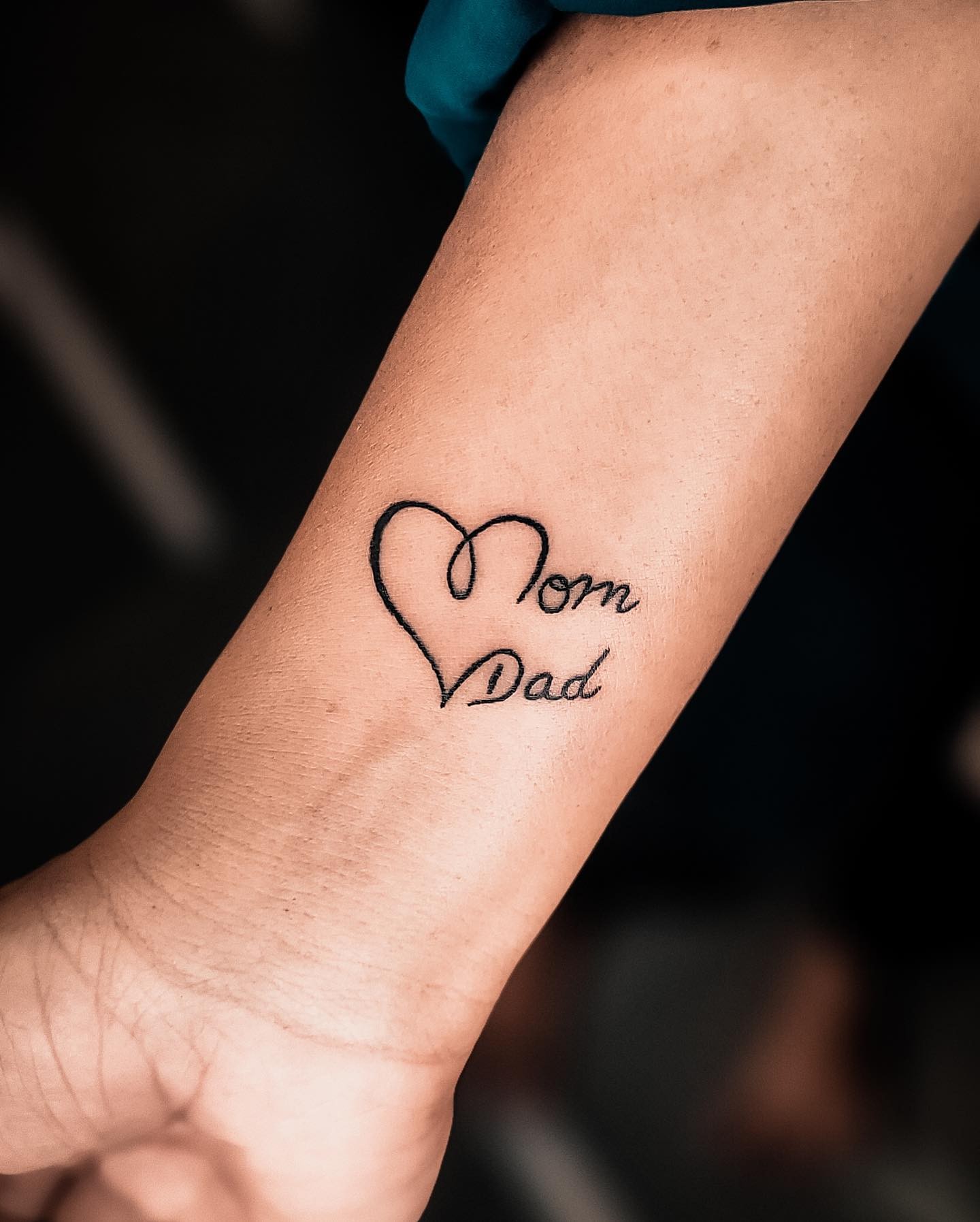 Adorable Mom And Dad Lettering Tattoo