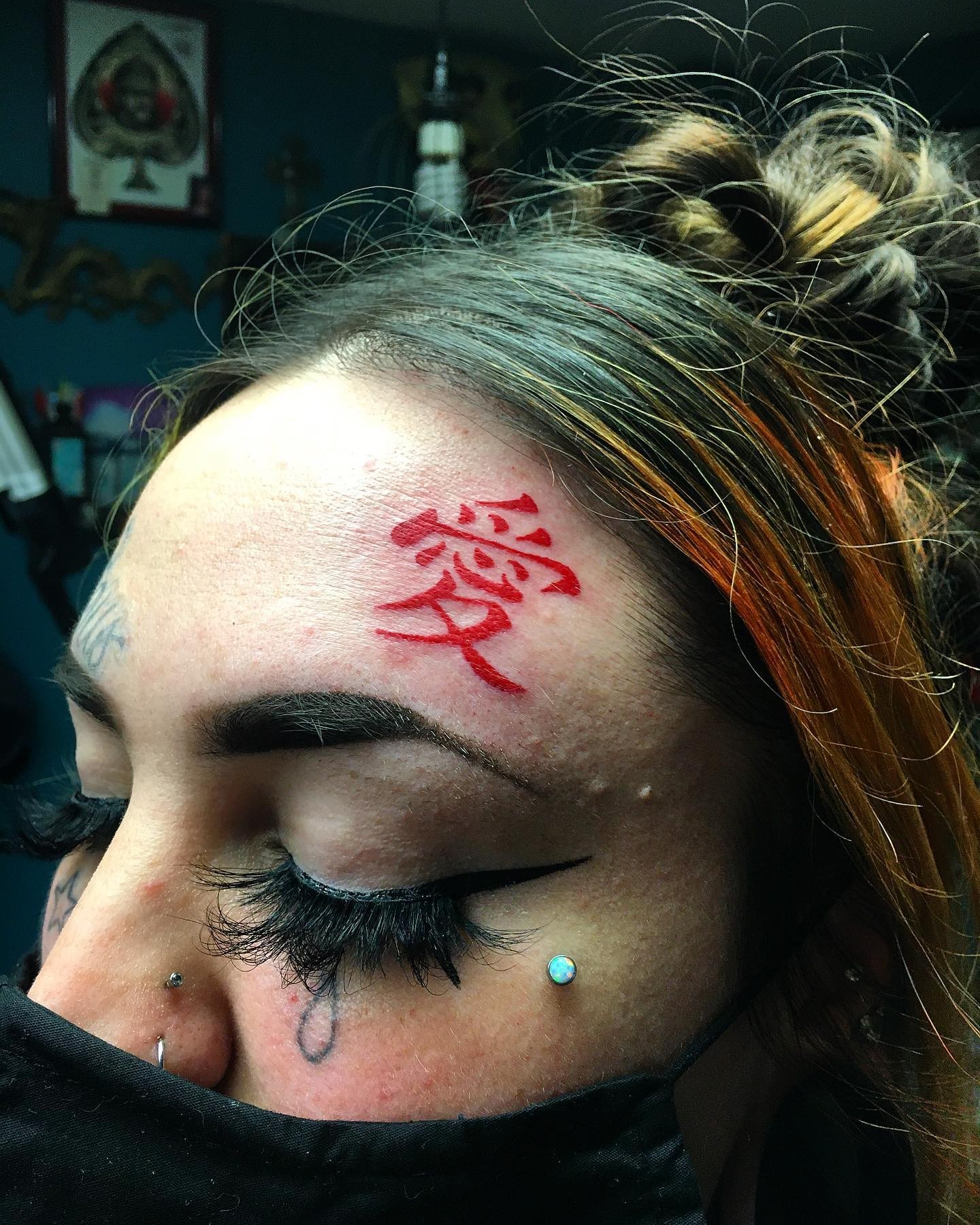 Japanese Kanji Love Tattoo On The Forehead