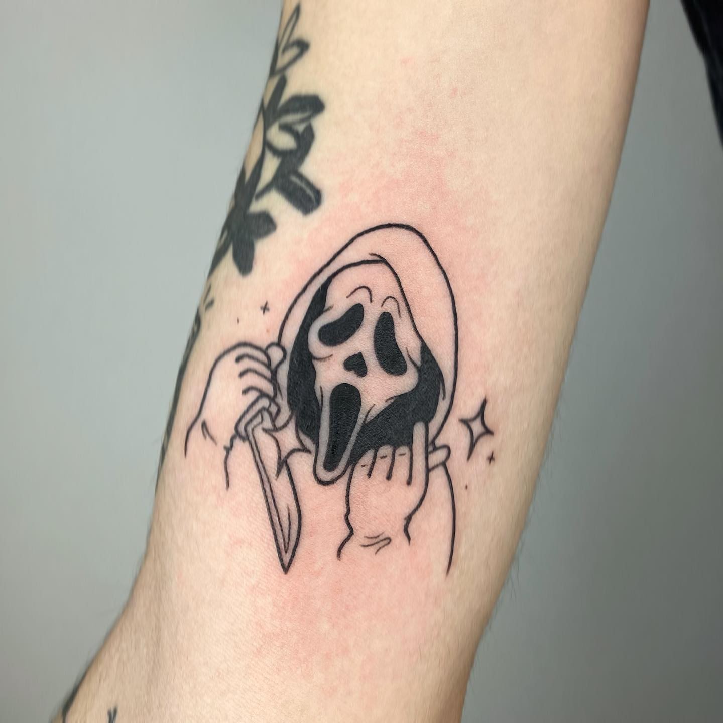 Minimal Tattoo Designs Based On The Movie ‘Scream’