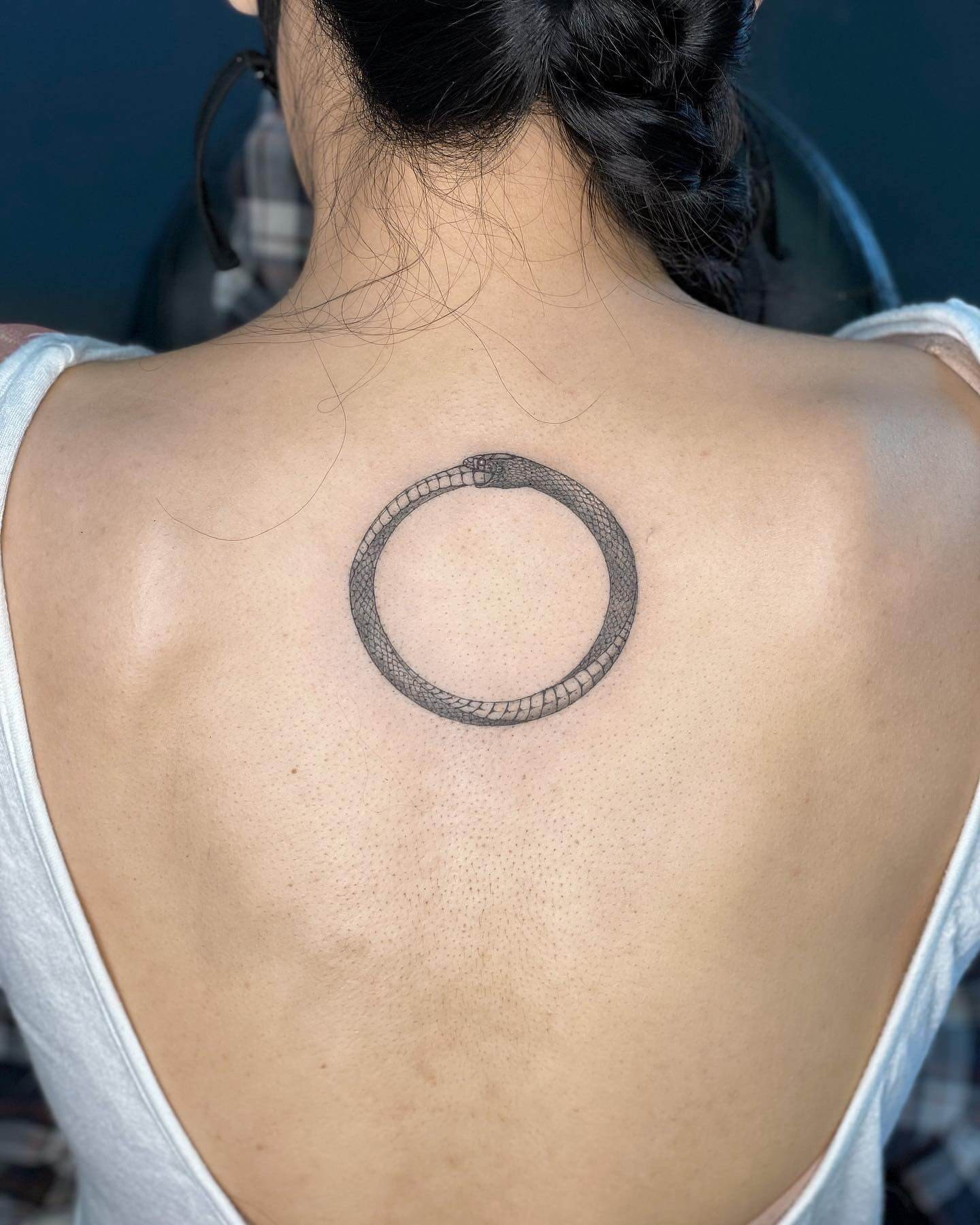 Eye Catching Ouroboros Symbol Tattoo Black and White