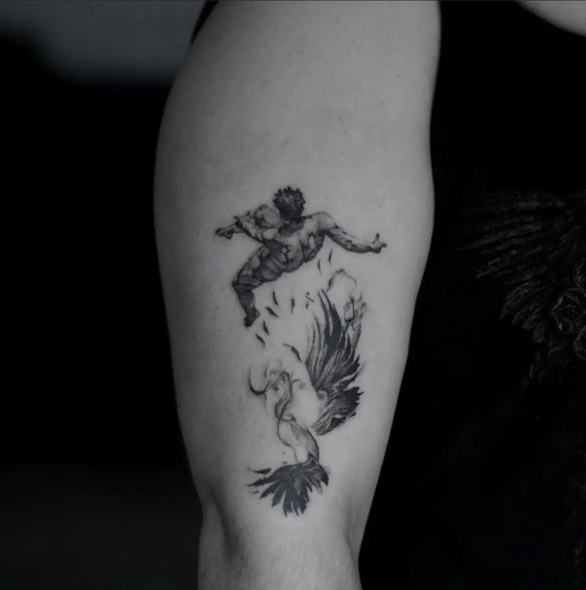 A Complex Graphic Icarus Tattoo