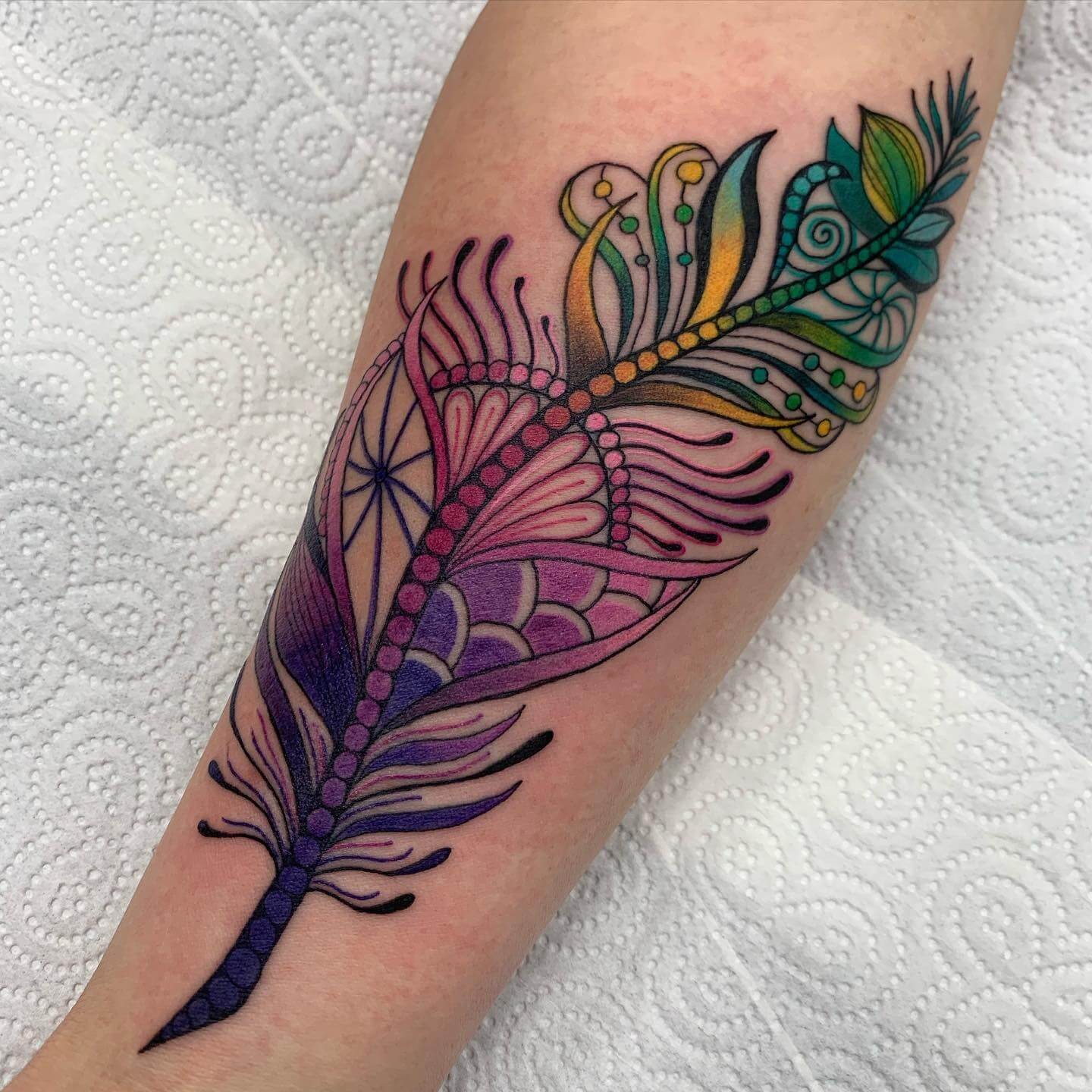 Ornamental And Colorful Feather Tattoo