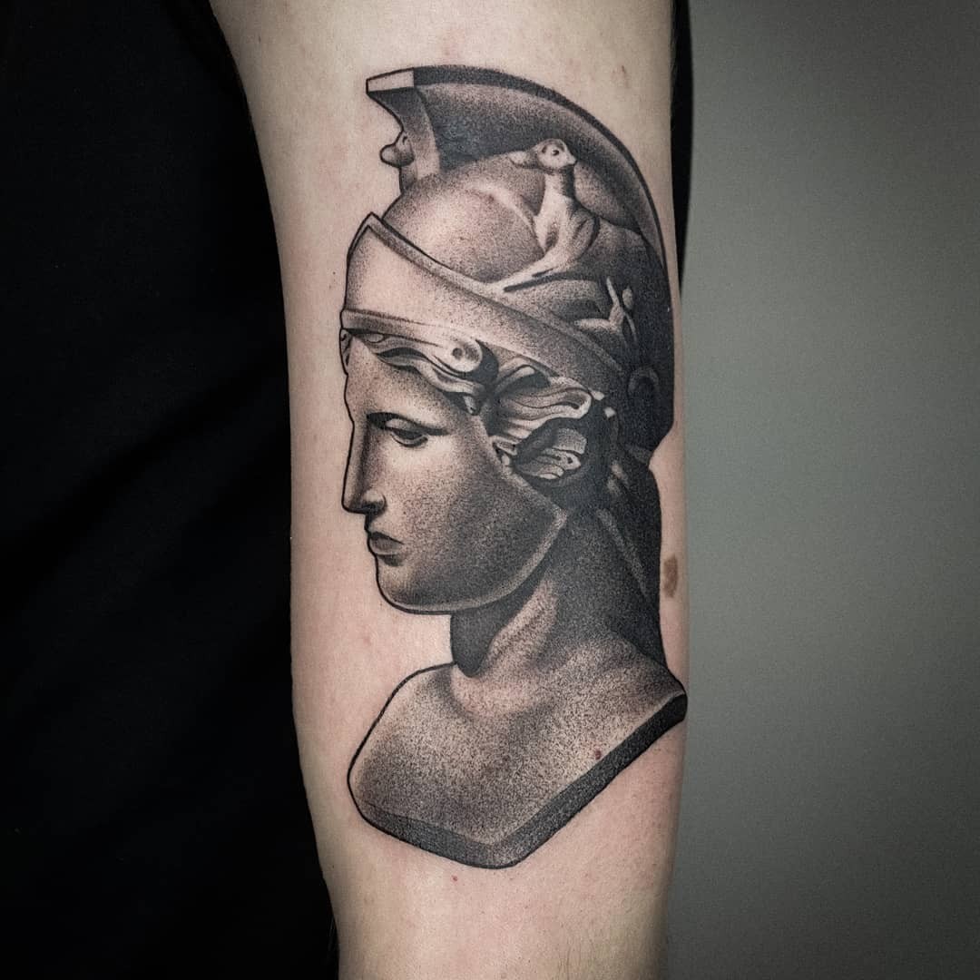 Small Tattoo Of Athena Black Ink