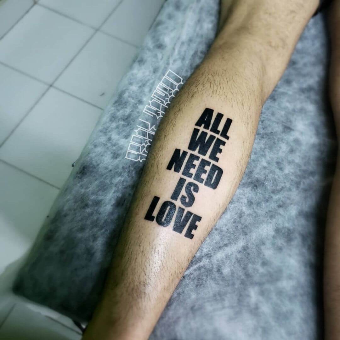 All We Need Is Love Leg Tattoo