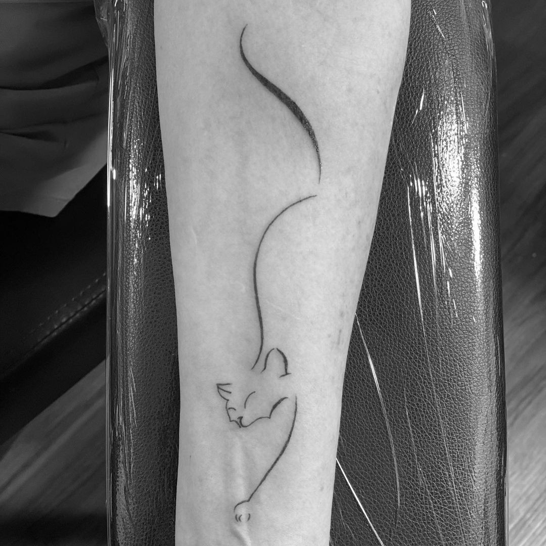 Minimalist Cat Outline Tattoo