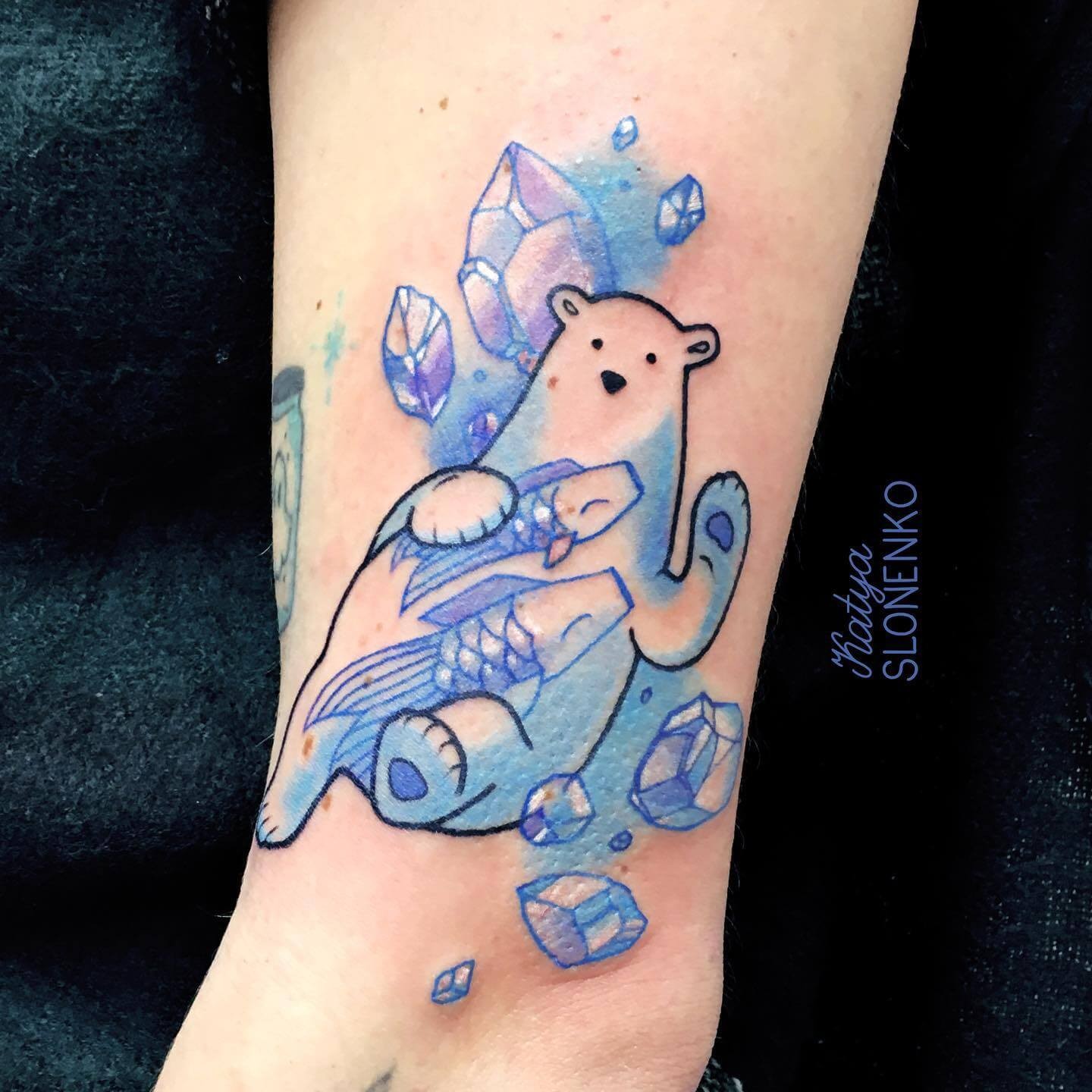 Feminine Polar Bear Tattoo