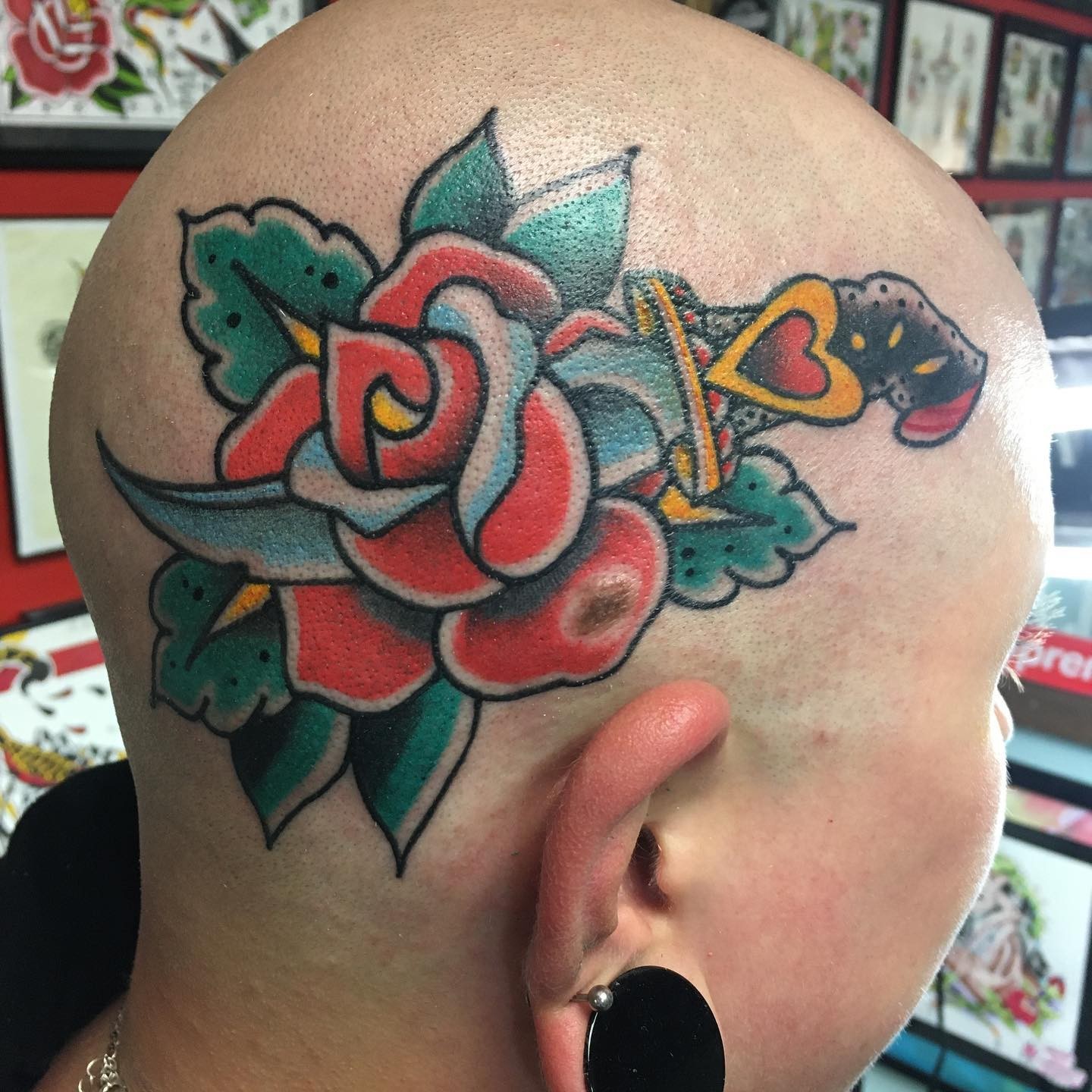 Rose Dagger Tattoo On Head