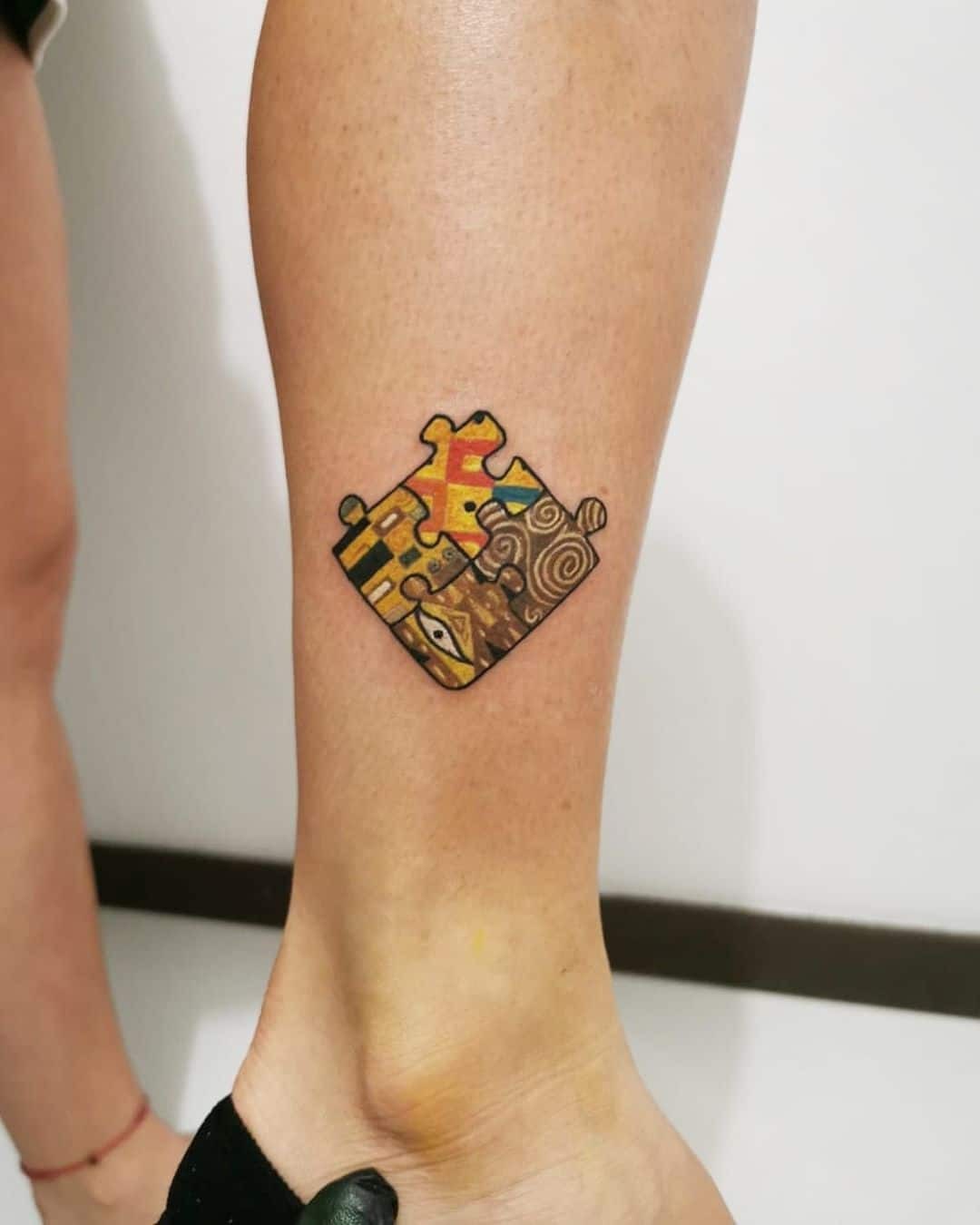 Puzzle Pieces Tattoo