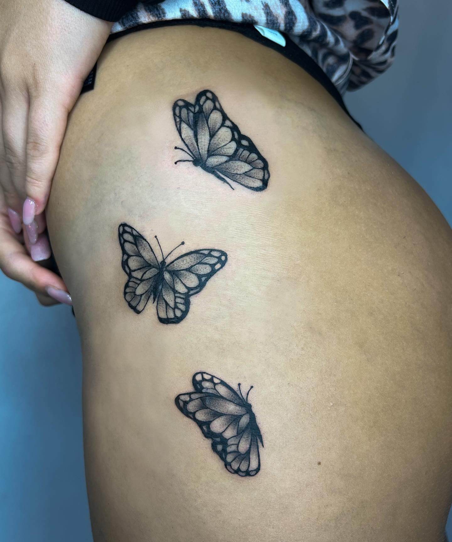 Simple Butterfly Tattoo On Hip