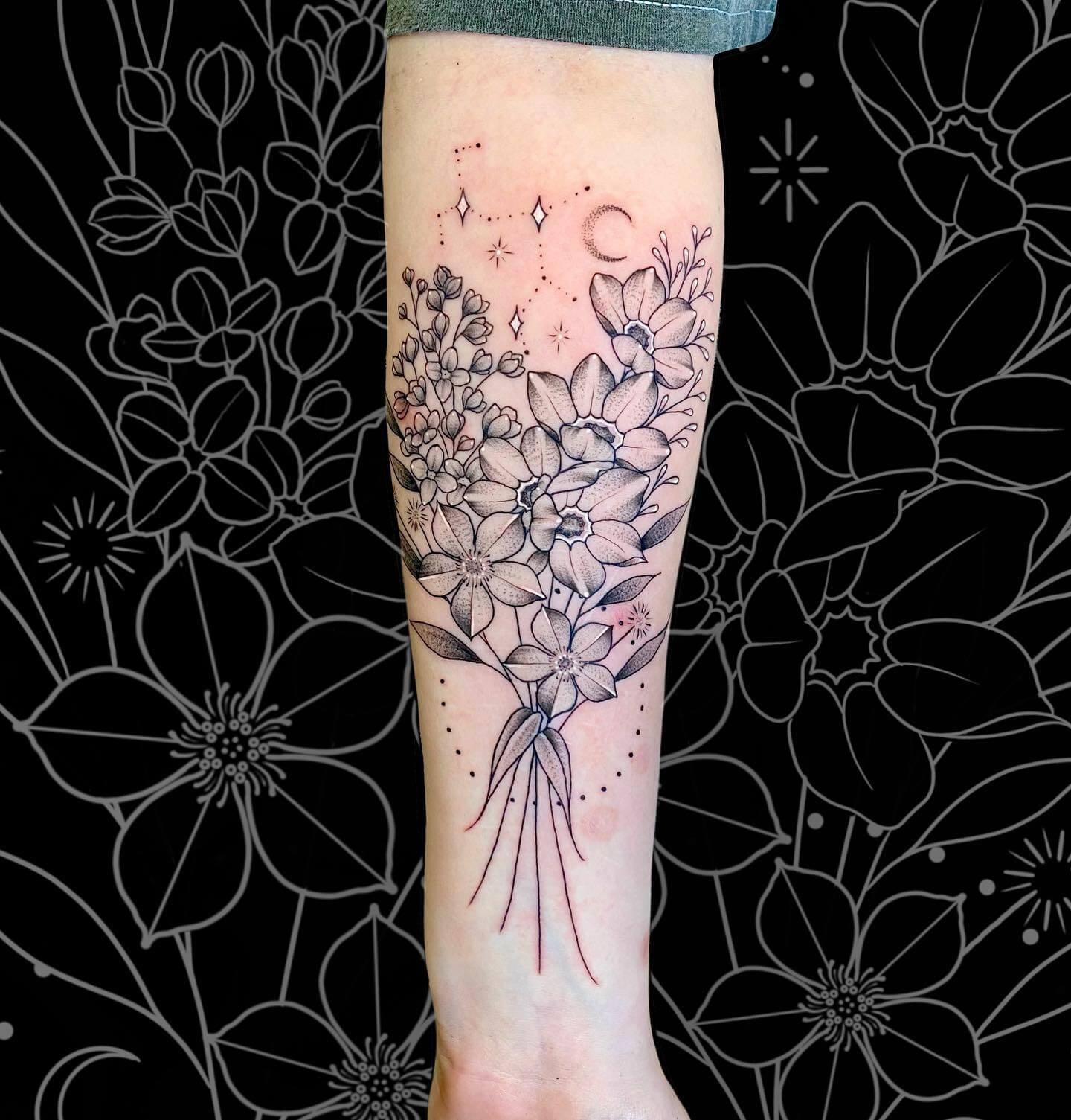 Sagittarius Tattoo Along With A Bouquet Of Flowers