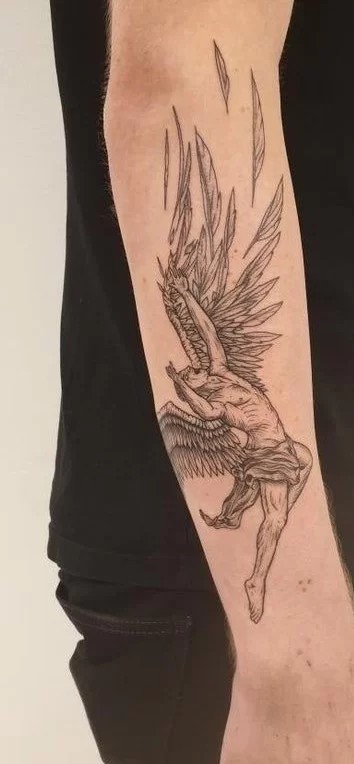 A Complex Graphic Icarus Tattoo